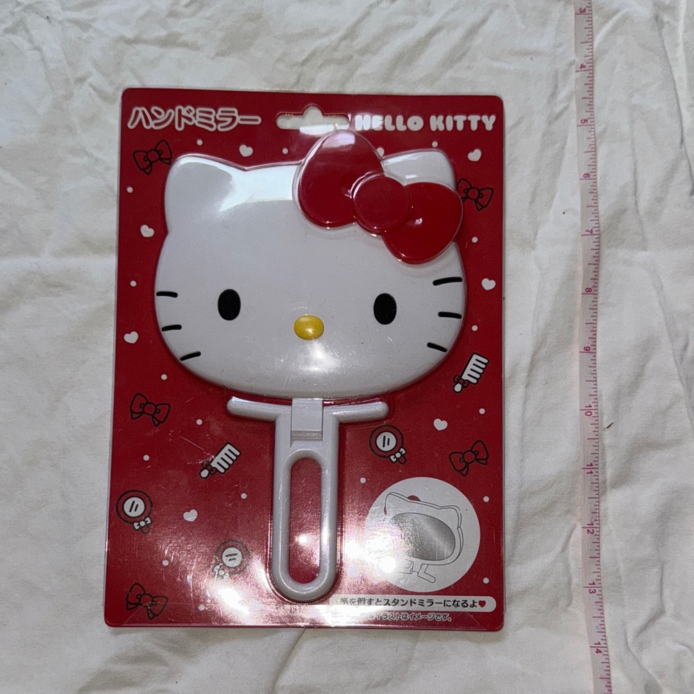 Hello Kitty Red and White Mirror hand held or can be stood up